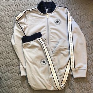 Converse track suit size 7